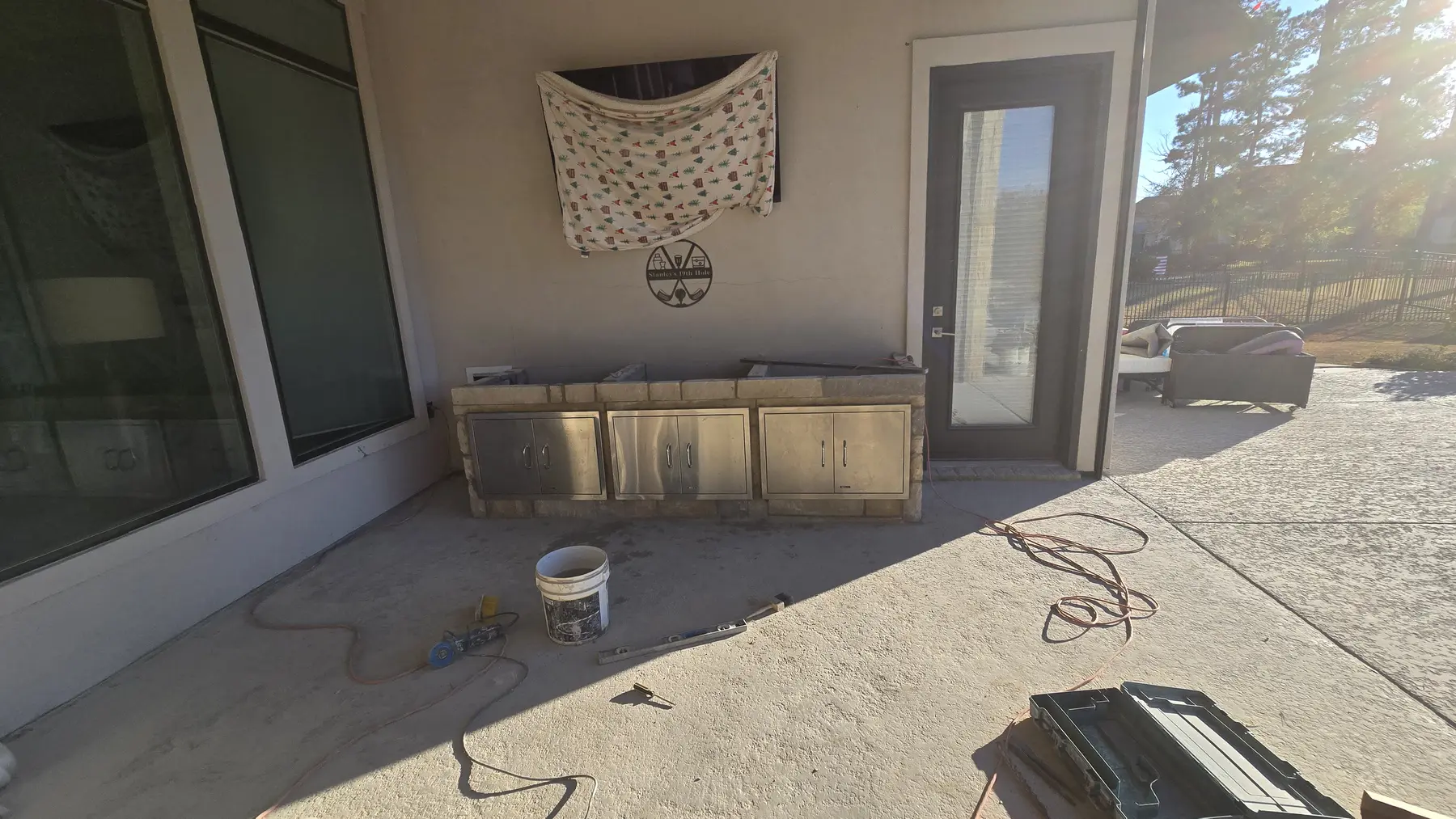 Covered outdoor-living wall under construction
